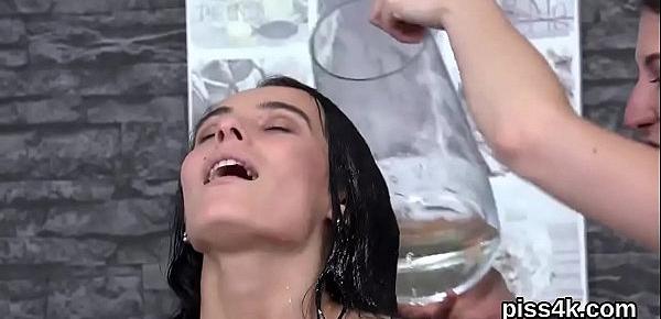  Erotic lesbian nymphos get splashed with pee and splash wet twats